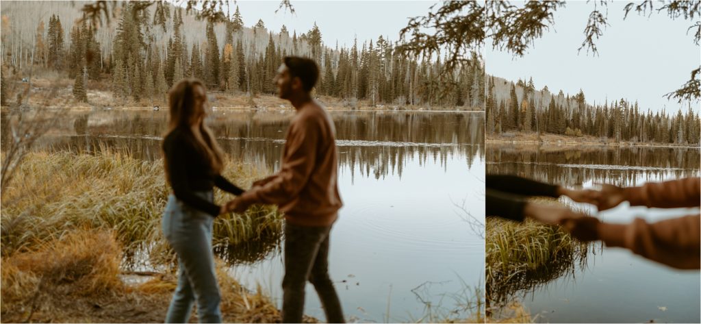 Couple holding hands in front of lake